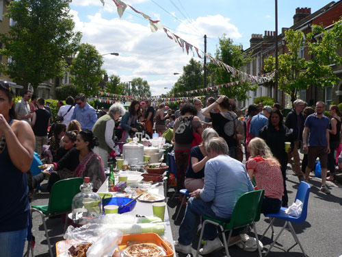 photo from 2013 of table and crowds